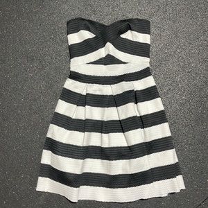 Express black and white strip stretchy dress. Size women’s medium.